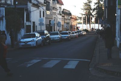 Cars on street in town