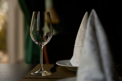 Close-up of wineglass on table