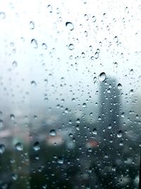 Full frame shot of wet glass window