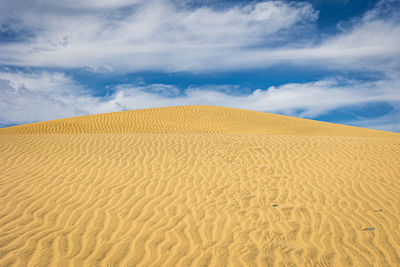 Scenic view of desert against sky