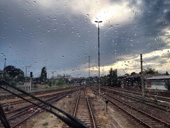 Railroad tracks seen through train windshield