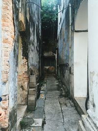 Narrow pathway along walls