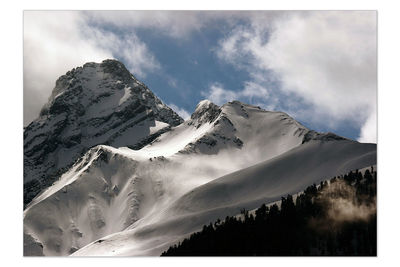 Scenic view of snow covered mountains