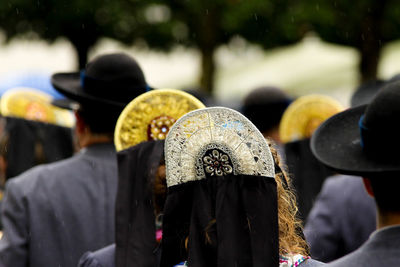 Rear view of people in traditional clothing