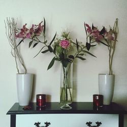 Close-up of vase on wall