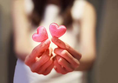 Close-up of woman hand holding heart