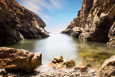 Scenic view of rock formation in sea