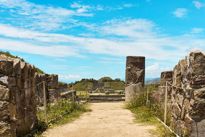 View of old ruin building against cloudy sky