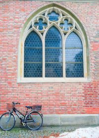 Bicycle against red window