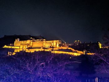 High angle view of illuminated buildings at night