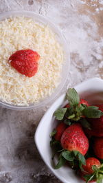 High angle view of strawberries in bowl on table