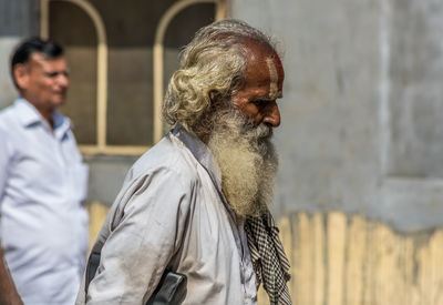 Side view of man standing outdoors