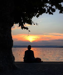 Silhouette of man standing on beach