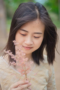 Portrait of a smiling young woman