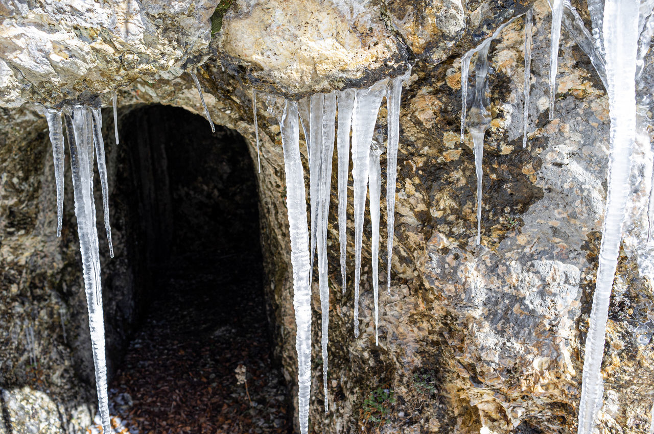 cave, no people, nature, icicle, formation, day, architecture, outdoors, water, ice, built structure, winter, tree, cold temperature, plant, beauty in nature, rock