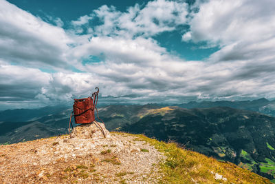 Burnt out petrol can in the dolomites, italy.