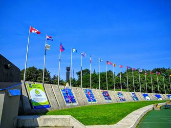 Flags against clear blue sky