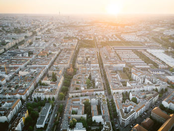 High angle view of city buildings against sky