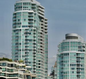 Low angle view of modern buildings against sky