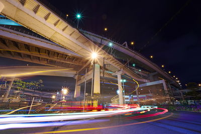 Light trails on bridge at night