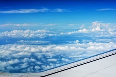 Aerial view of cloudscape seen from airplane window