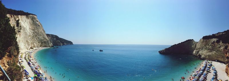 Scenic view of sea against clear blue sky