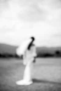 Woman walking with umbrella