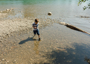 High angle view of boy on beach