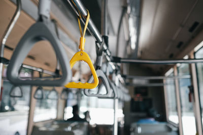 Close up of grab handles in a bus