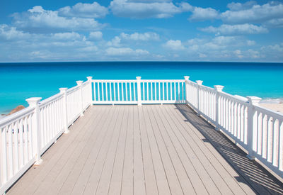 Pier on sea against sky