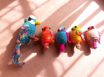 High angle view of multi colored toys on floor