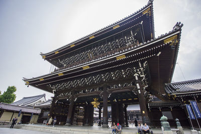 Group of people in temple against building