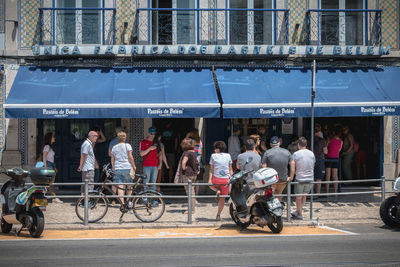 People on street in city