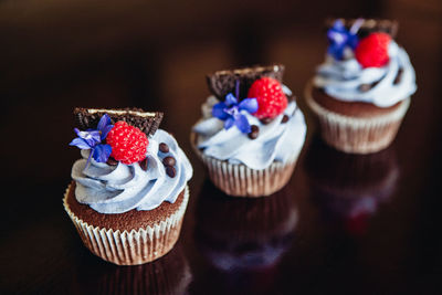 Close-up of cupcakes on table