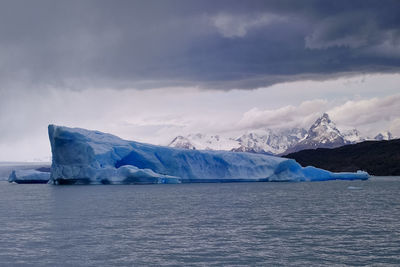 Scenic view of frozen sea against sky