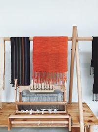 Chairs and table against wall