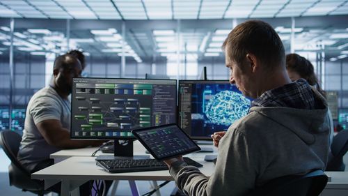 Man using laptop at office
