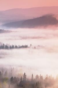 Scenic view of mountains against sky during sunset