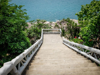 High angle view of steps by sea