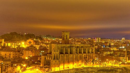 City of manresa, at dusk, with la seu in the foreground