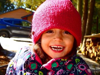 Portrait of happy girl wearing hat