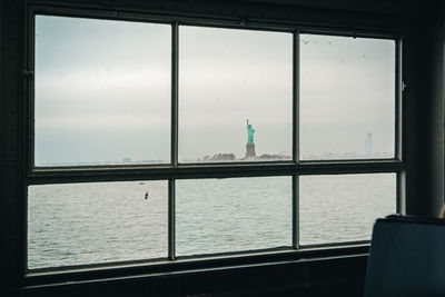 Buildings seen through glass window