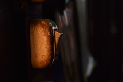 Close-up of old metal in container