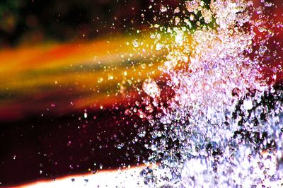 Full frame shot of raindrops on glass window