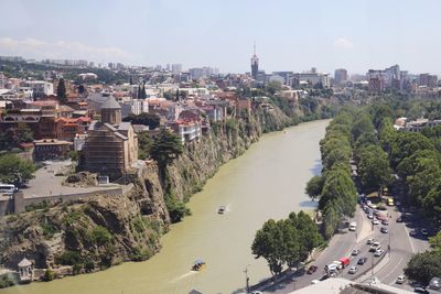 High angle view of street amidst buildings in city