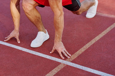 Low section of man running