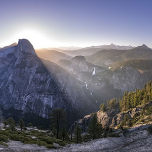 Scenic view of mountains against sky during winter