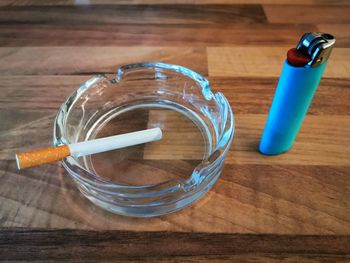 High angle view of drink in glass on table