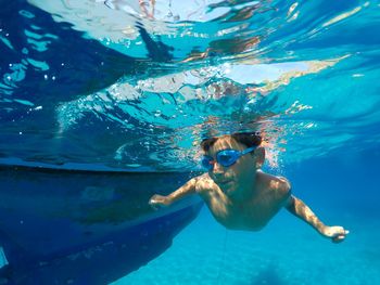 Woman swimming in sea