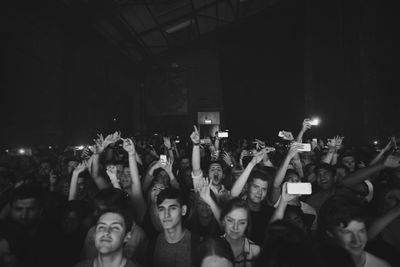 Crowd with mobile phones at music festival